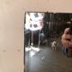 Miroir sur pied 1970 travertin