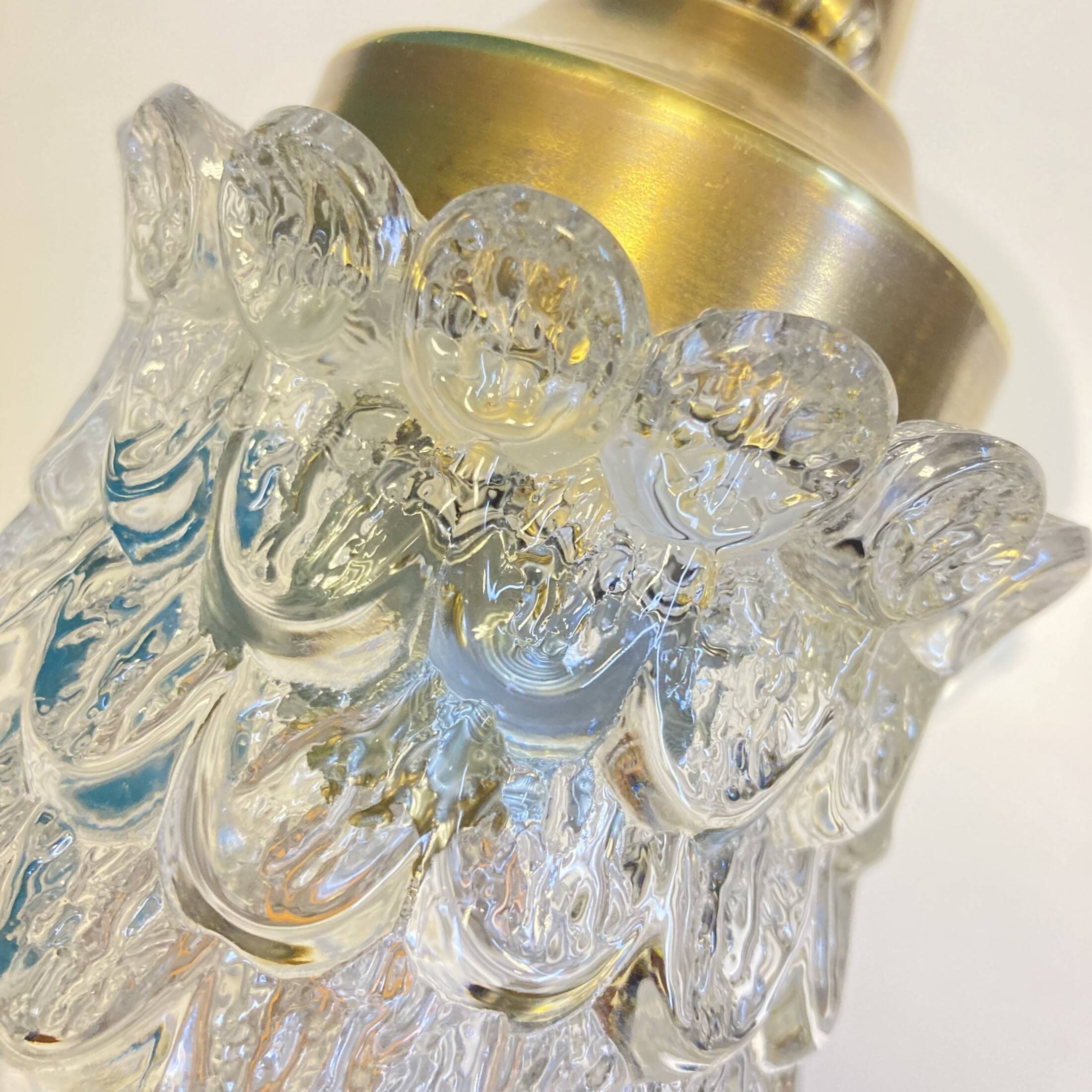 Old brass swan neck wall light and transparent glass tulip vintage decoration
