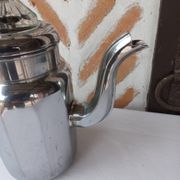 Silver metal coffee maker with glass cap