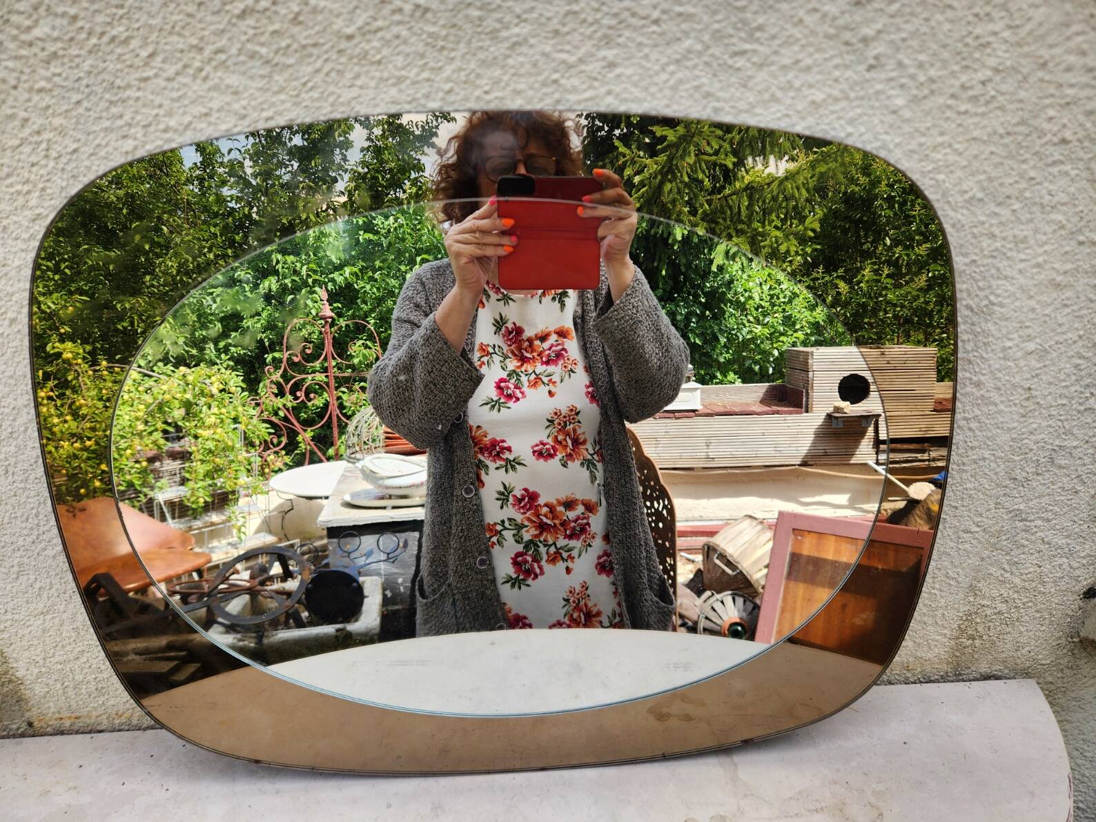 Vintage smoked bronze wall mirror, free form, 1970s – 70 x 55 cm