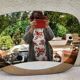 Vintage smoked bronze wall mirror, free form, 1970s – 70 x 55 cm