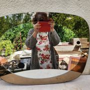 Vintage smoked bronze wall mirror, free form, 1970s – 70 x 55 cm