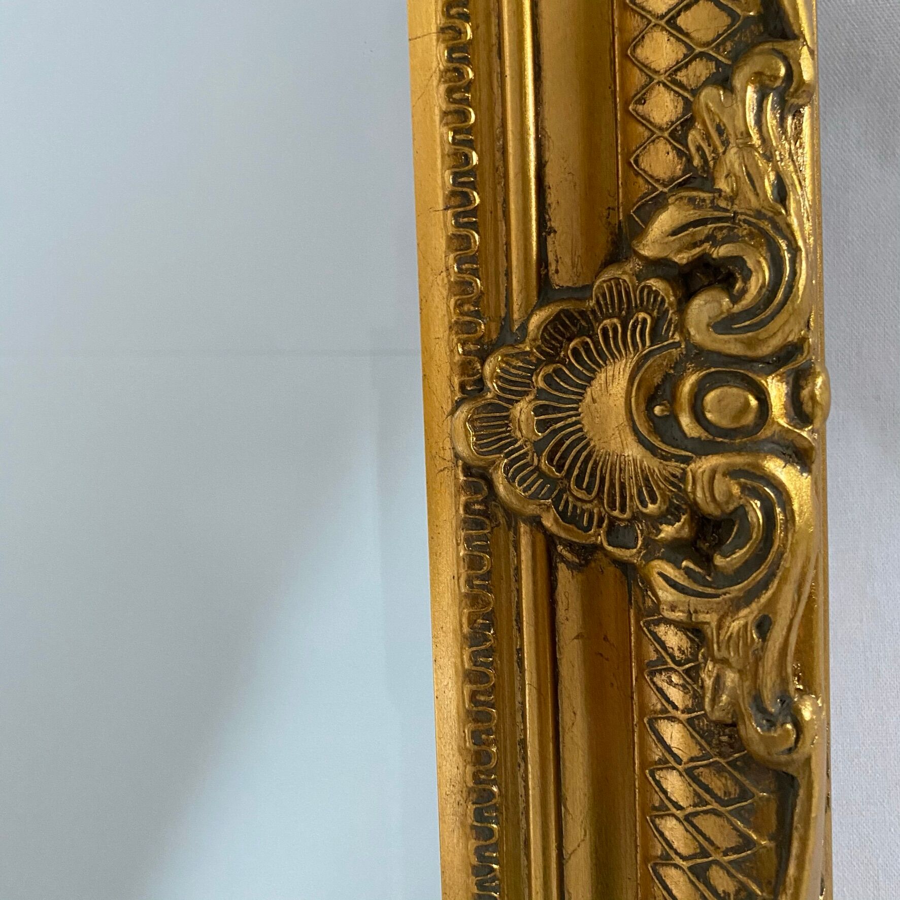 Bevelled mirror, golden empire style 74x64cm