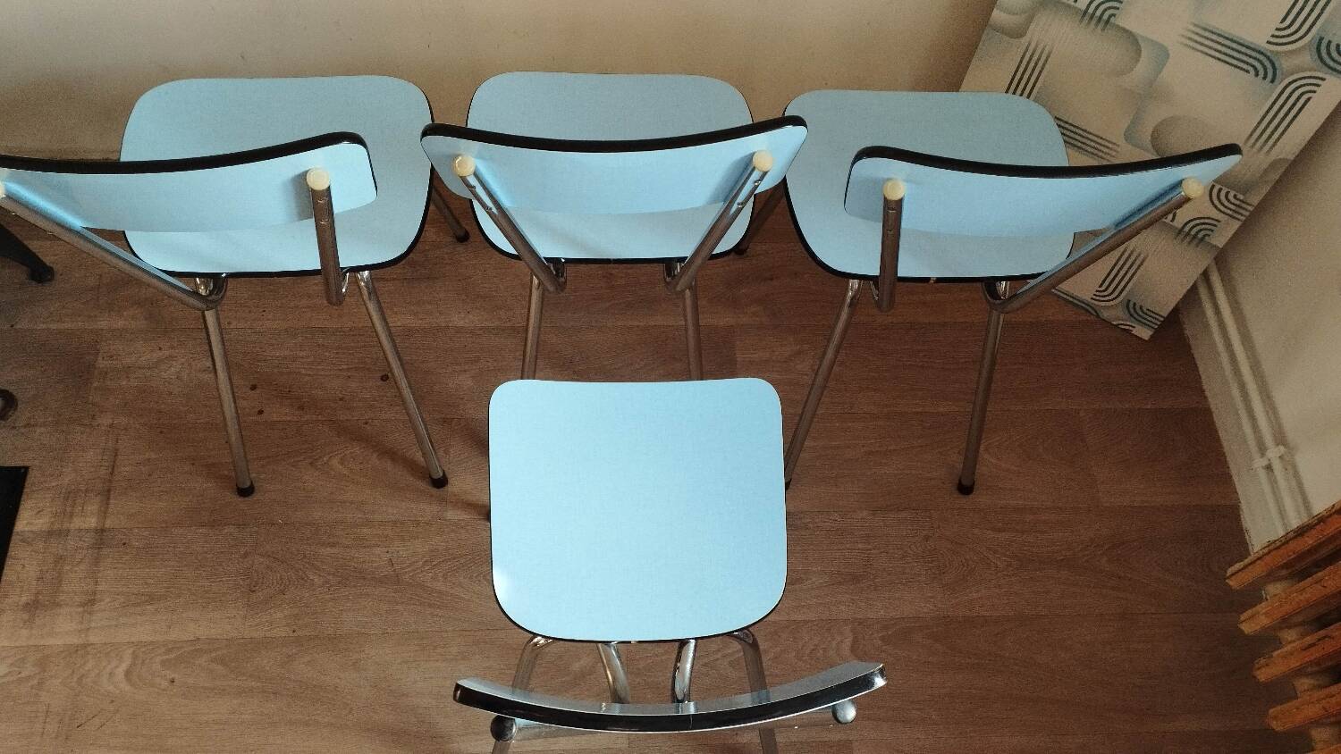 4 blue Formica chairs