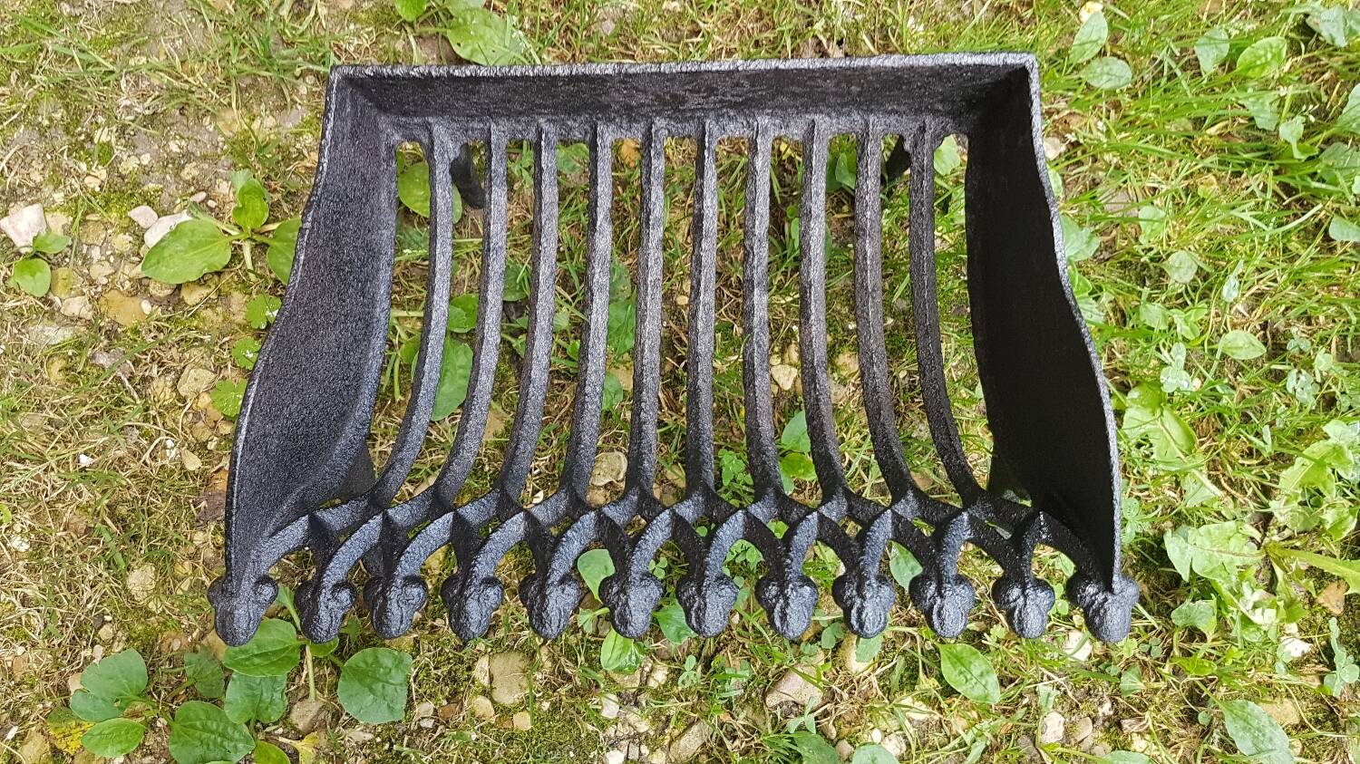 Old vintage black cast iron fireplace