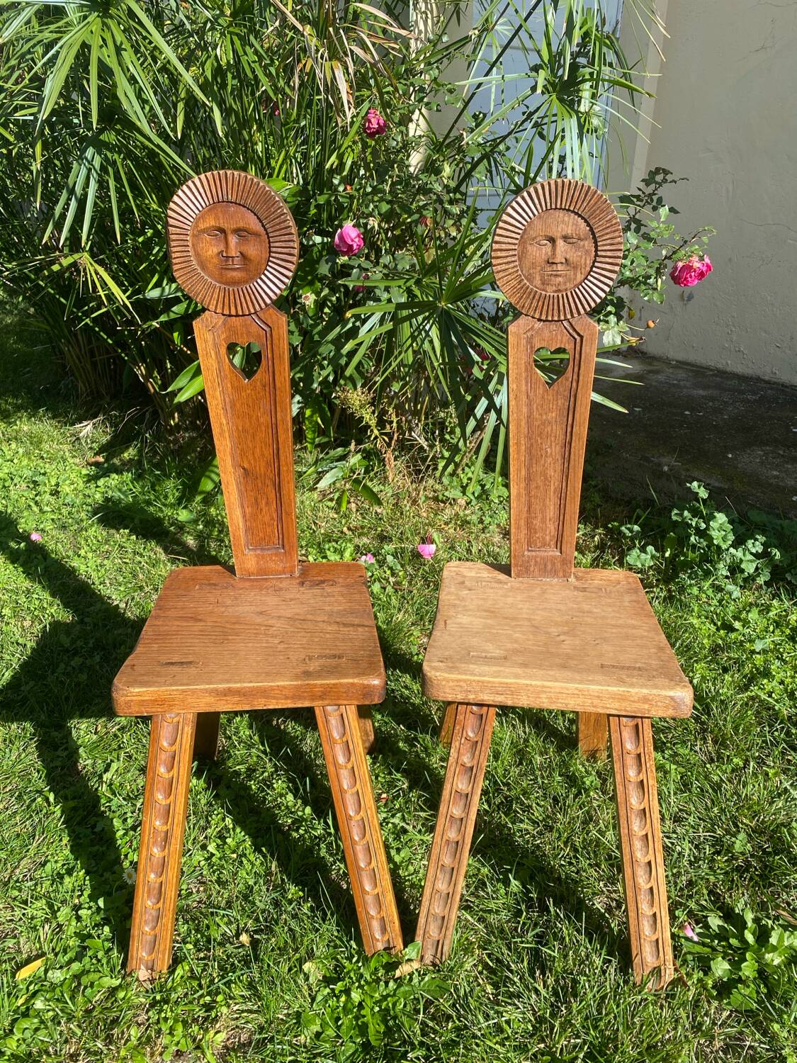 Pair of antique Catalan chairs with sun face motifs, Cerdagne