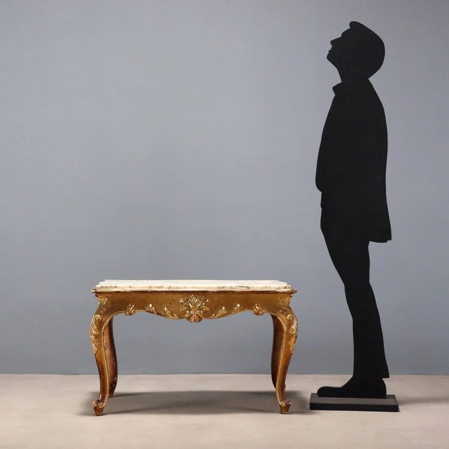 Small antique baroque-style table in carved fir and marble from the 19th century.