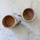 Set of artisanal pitcher and weathered cups