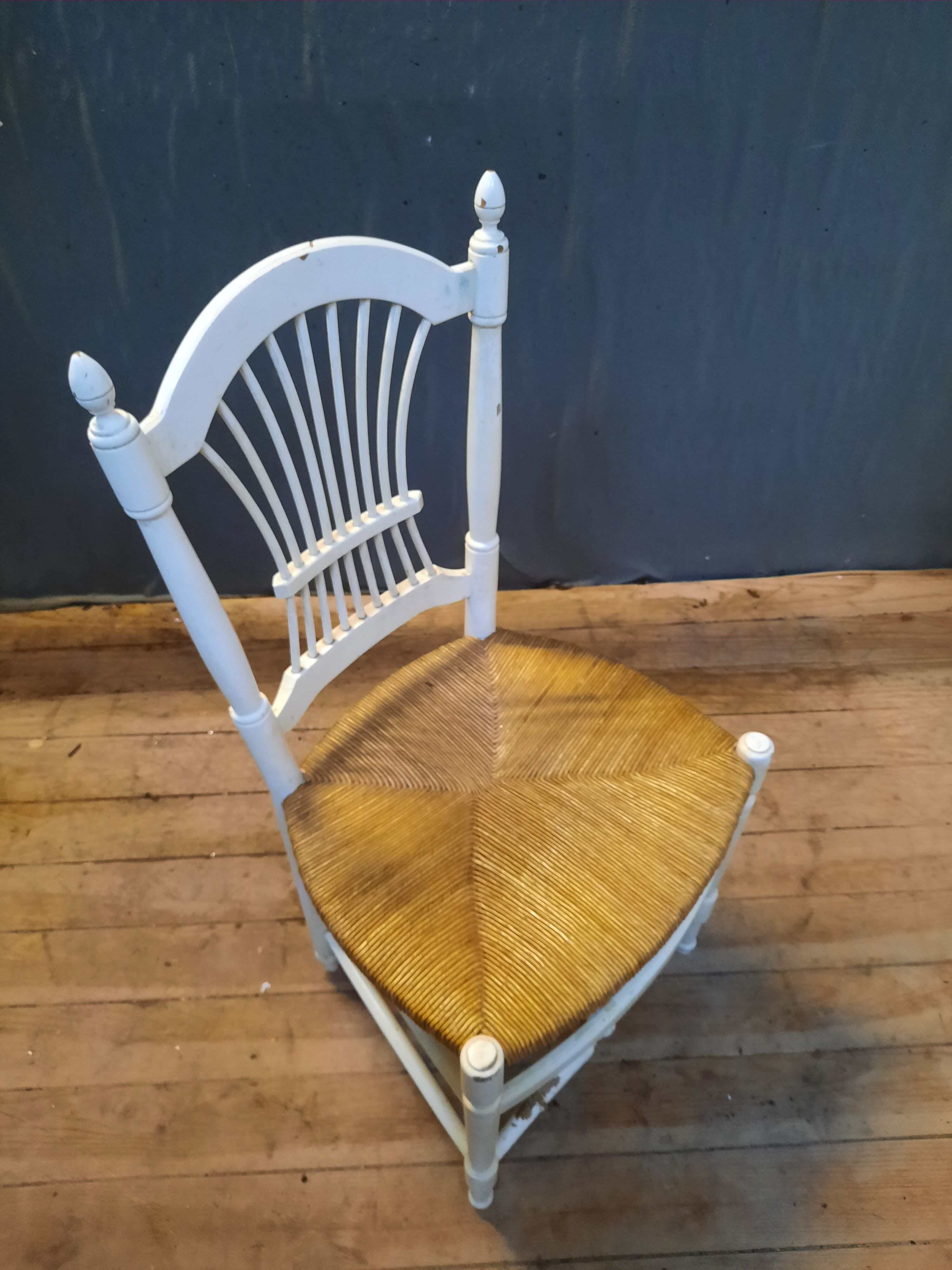 Series of 4 white straw chairs countryside