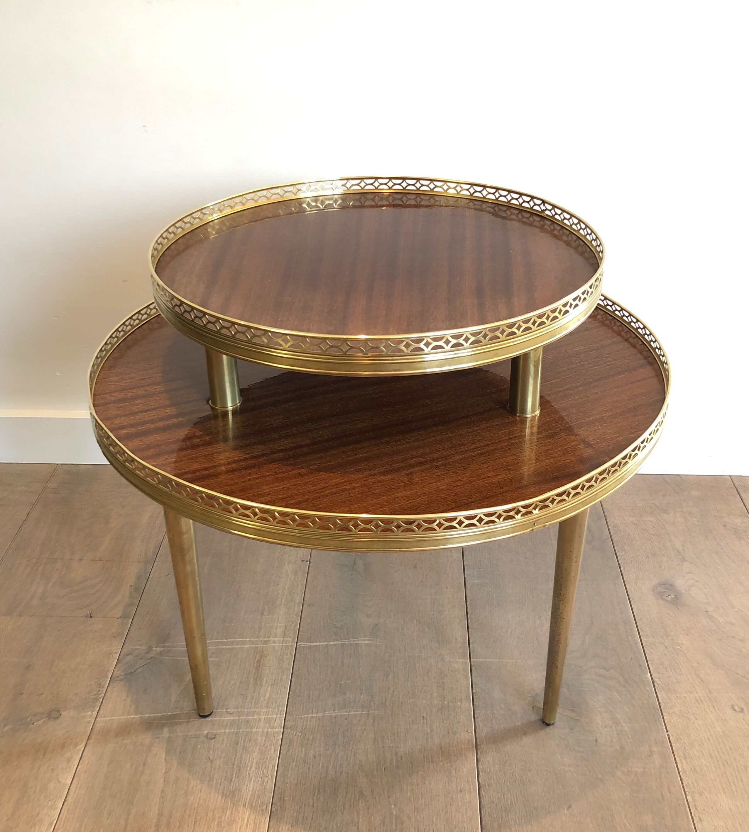 Neoclassical style tripod pedestal in mahogany, brass