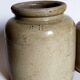 Set of three pots with old condiments in glazed earth