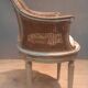 Caned armchair in Louis XVI style