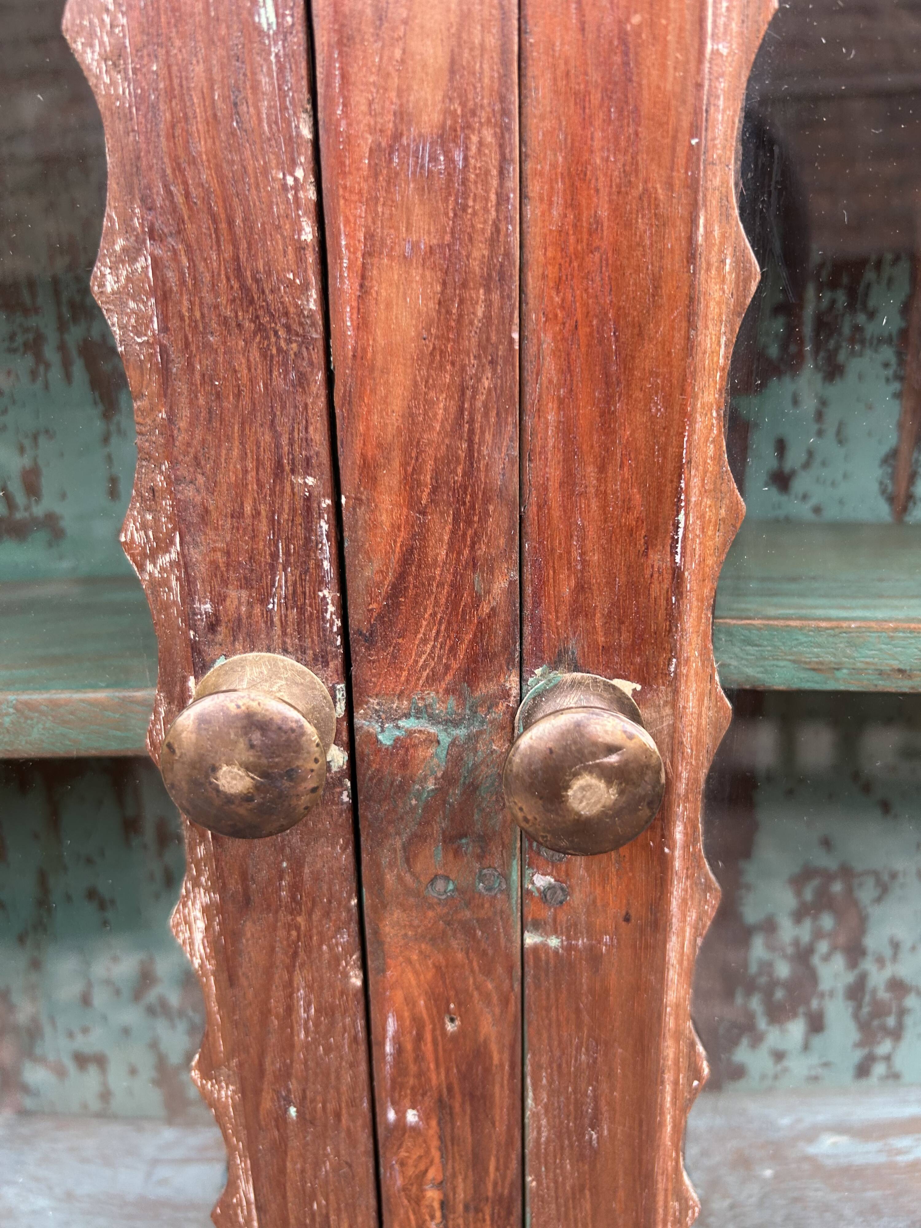 glass library in Burmese teak