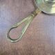 Vintage brass cellar rat, geometric handle in Art Deco style.