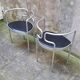 Pair of aluminum armchairs by Henning Larsen