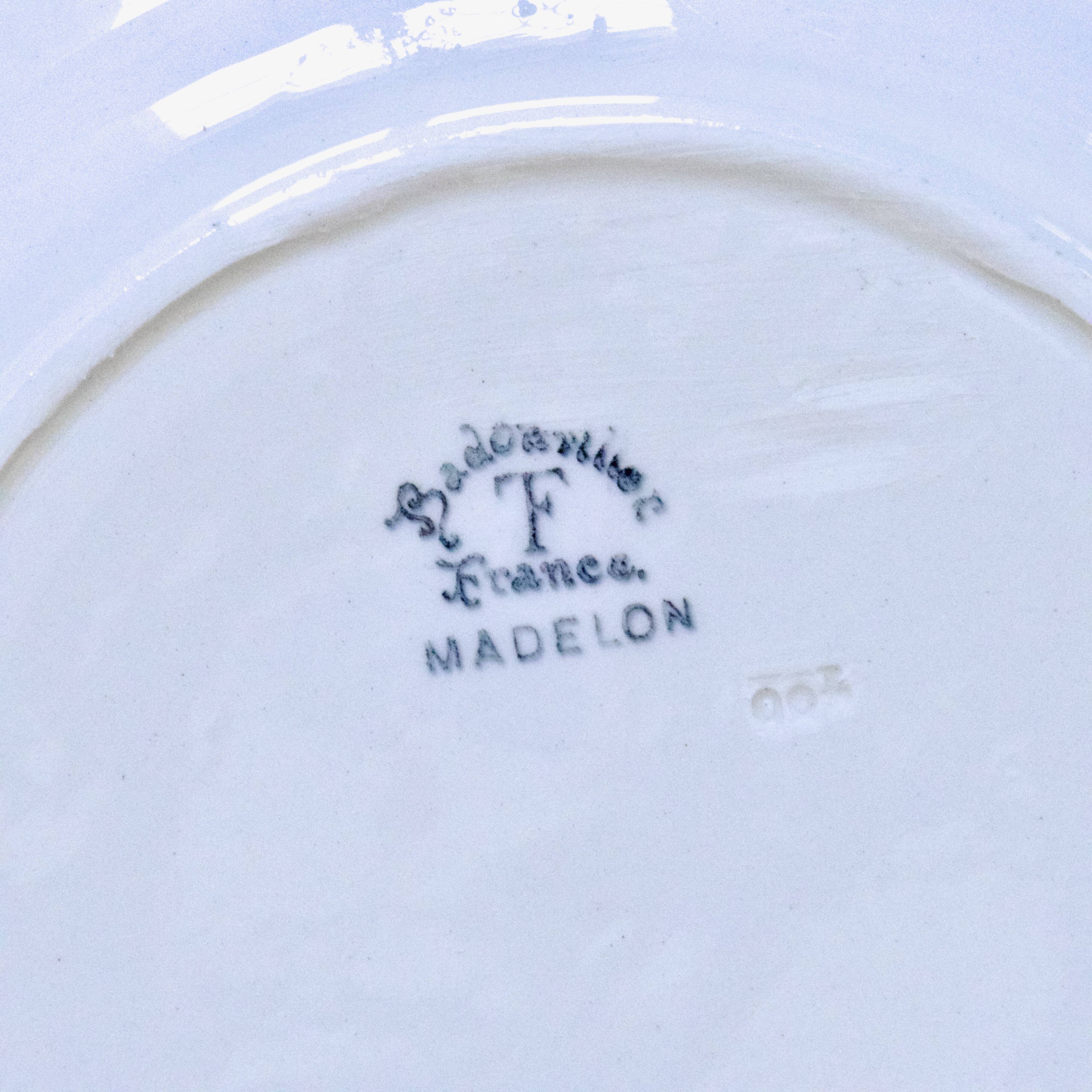 Round antique plate signed Badonviller collection "Madelon" hand-painted.
