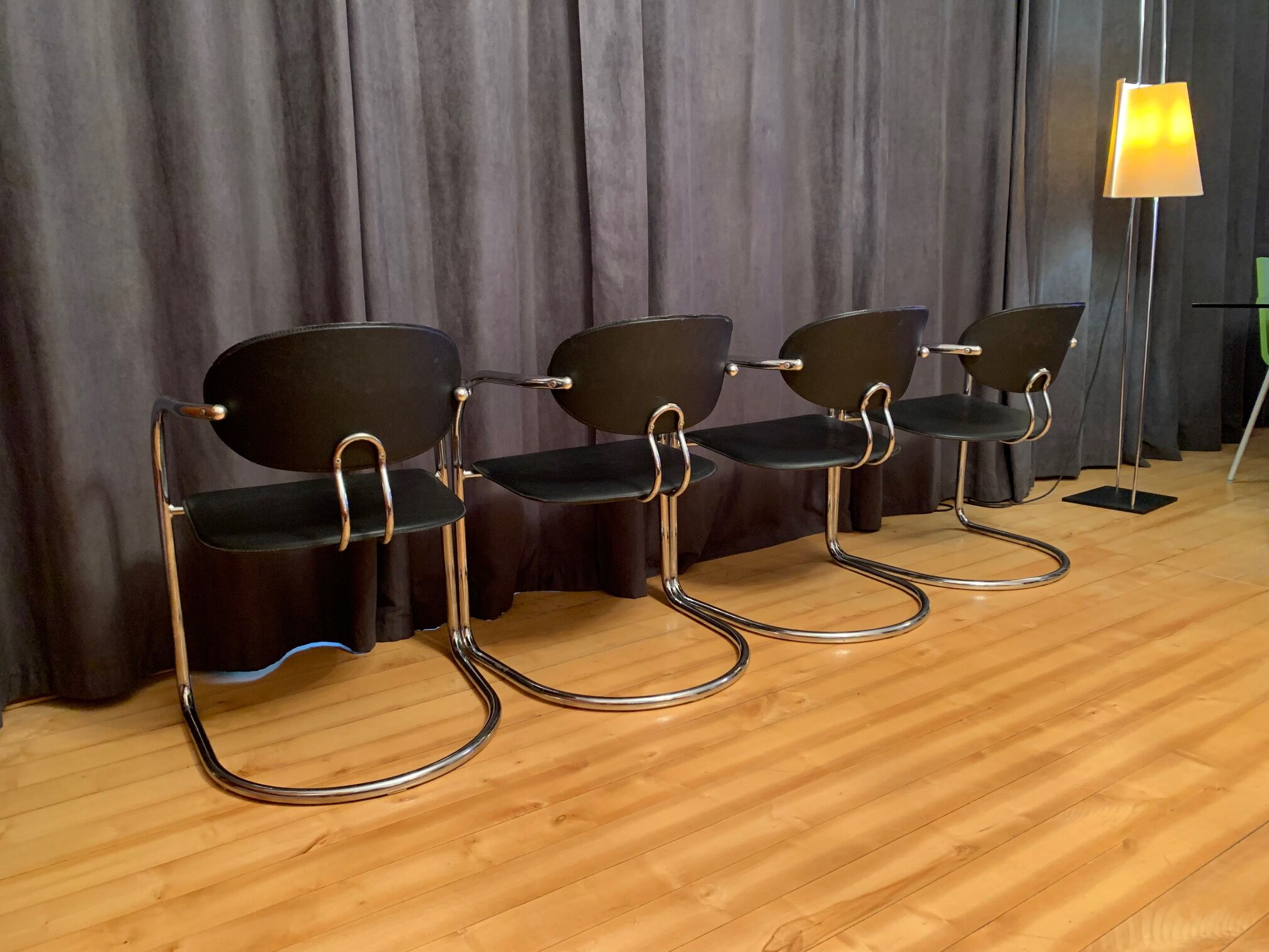 A set of four chairs, Italy, 1980s.