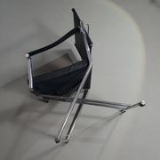 2 chaises pliantes en cuir chromé
