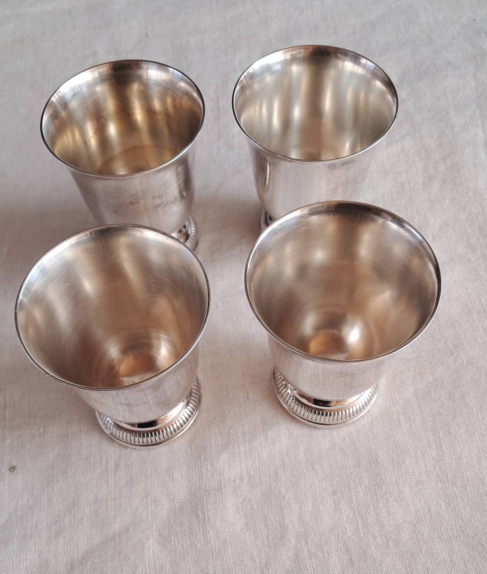 Superb set of 4 silver-plated goblets from the famous house.