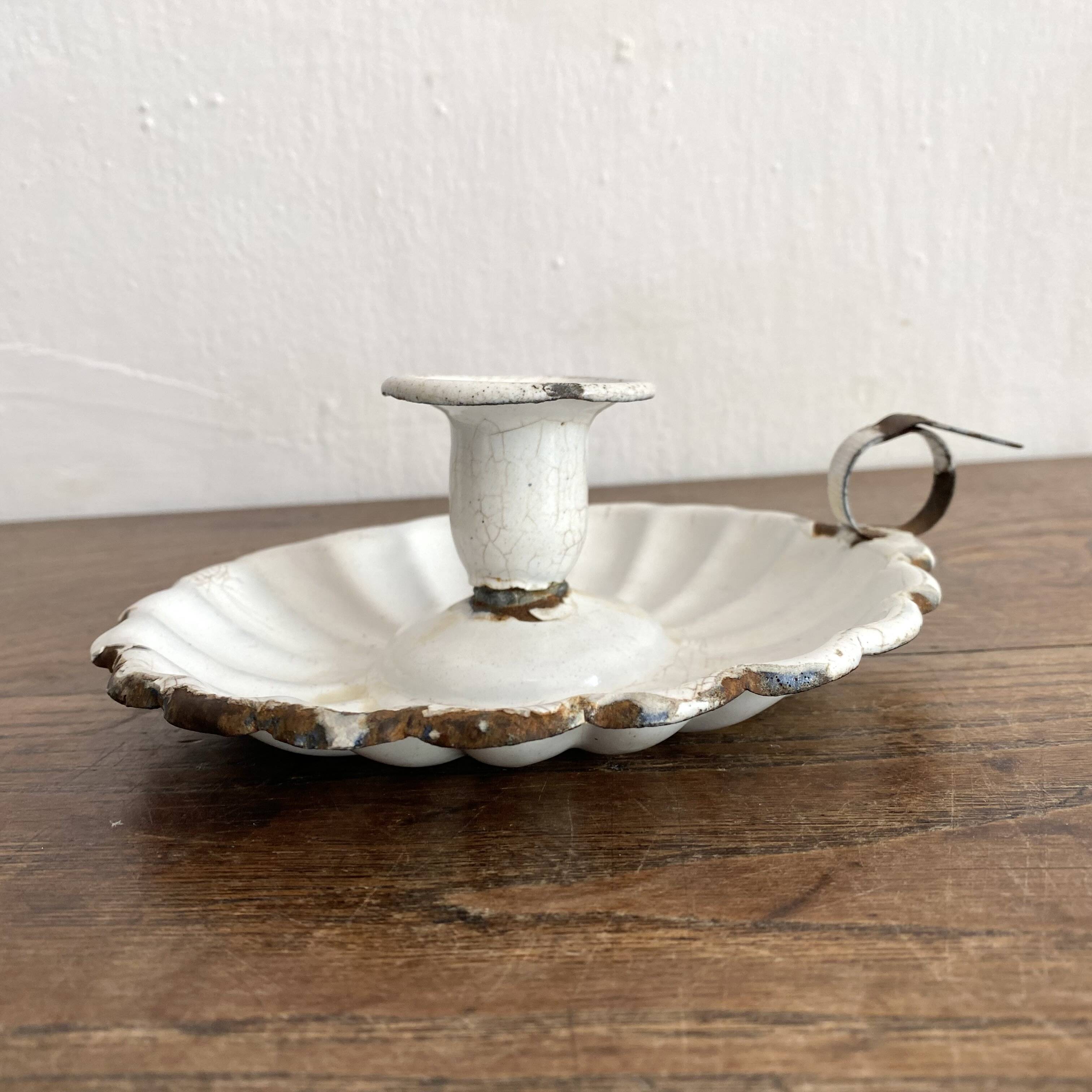 Antique enamelled sheet metal candle holder