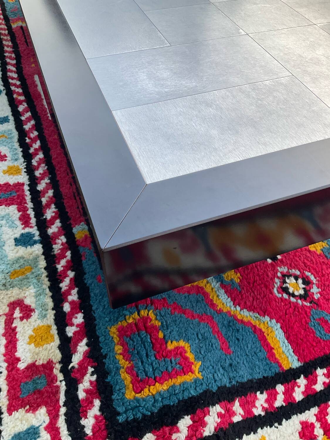 Vintage coffee table in stainless steel and black lacquered wood.