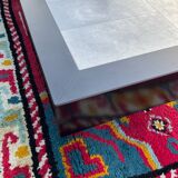 Vintage coffee table in stainless steel and black lacquered wood.