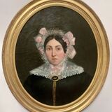 Oil on canvas Pair of portraits in gilded oval frames, 19th century