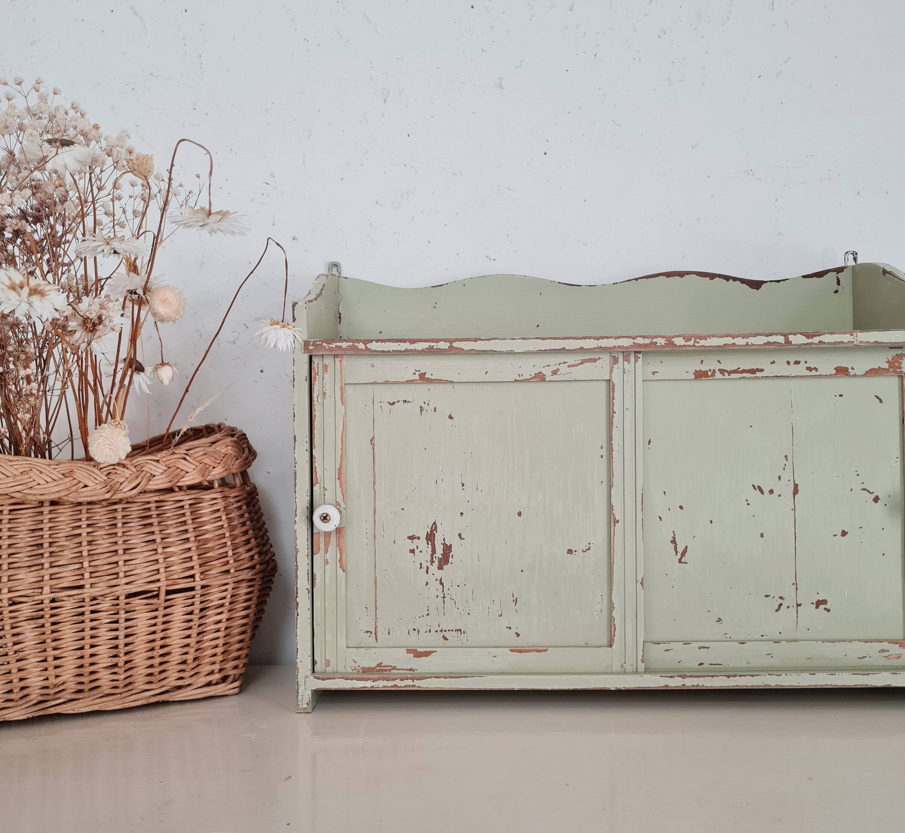 Small old wall shelf with sliding doors