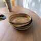 Round rattan and brass trays 1970 by Gabriella Crespi