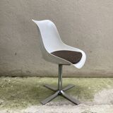 Roche Bobois tulip chair in moulded plastic with a chrome star base.