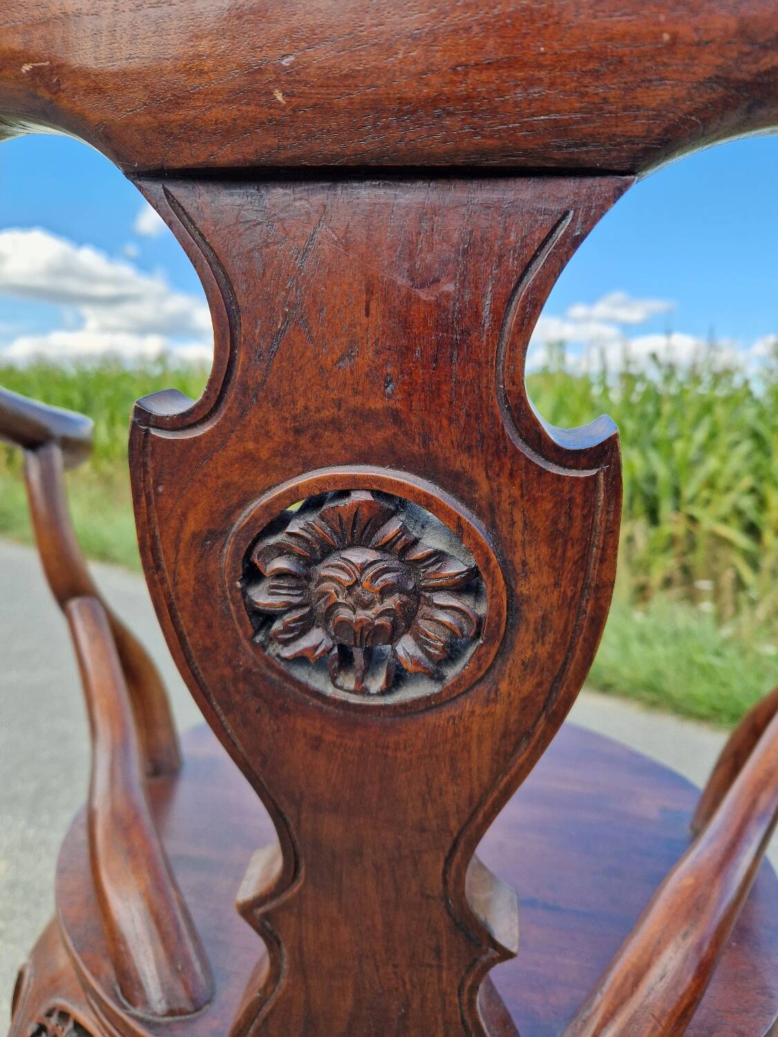 Pair of antique Chinese carved mahogany armchairs, circa 1960s