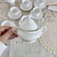 Vintage porcelain tea/coffee service with gold edging for 6 people, sugar bowl and milk jug