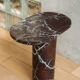"Bold" side table in Rosso Levanto marble