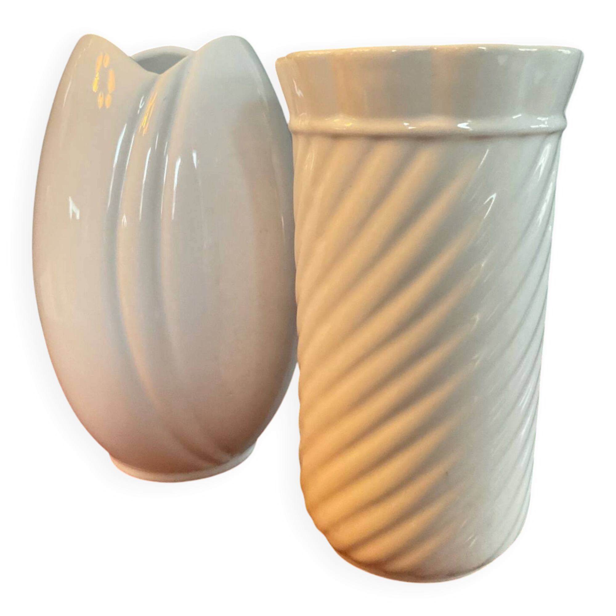 A pair of vintage ceramic vases from the 1970s.