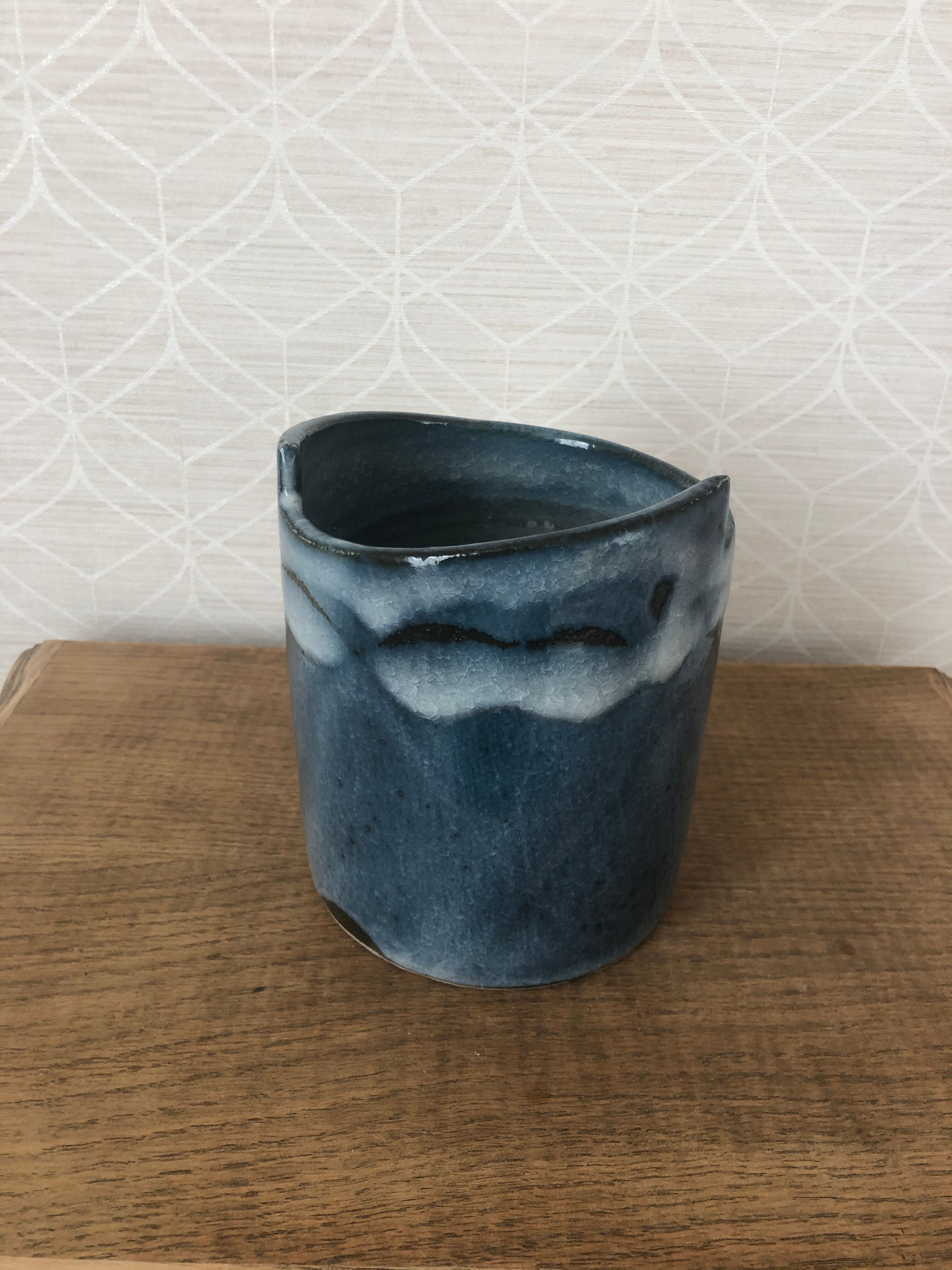 Vintage blue vase in varnished sandstone
