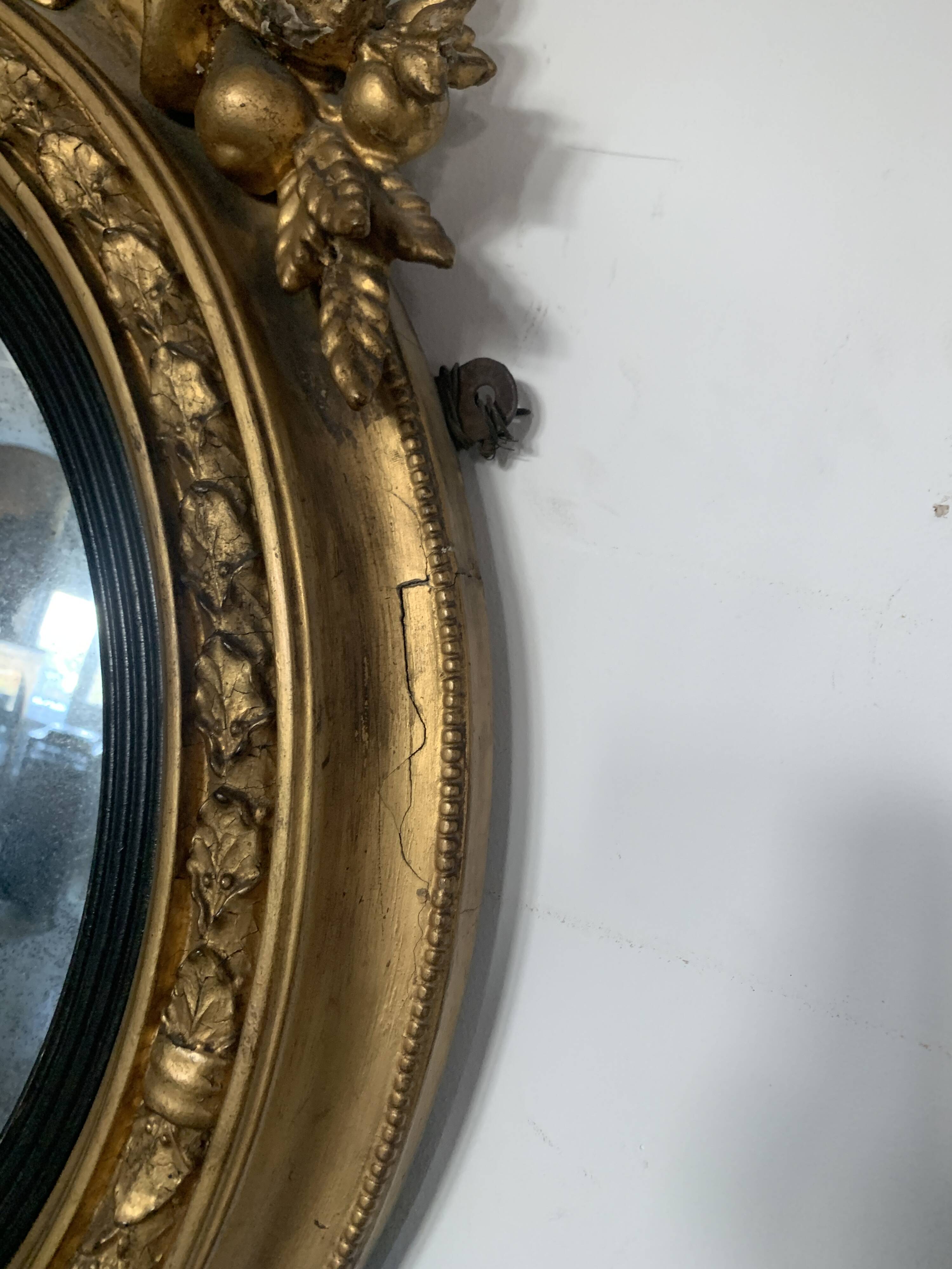 Miroir sorcière en bois sculpté doré XIX siècle