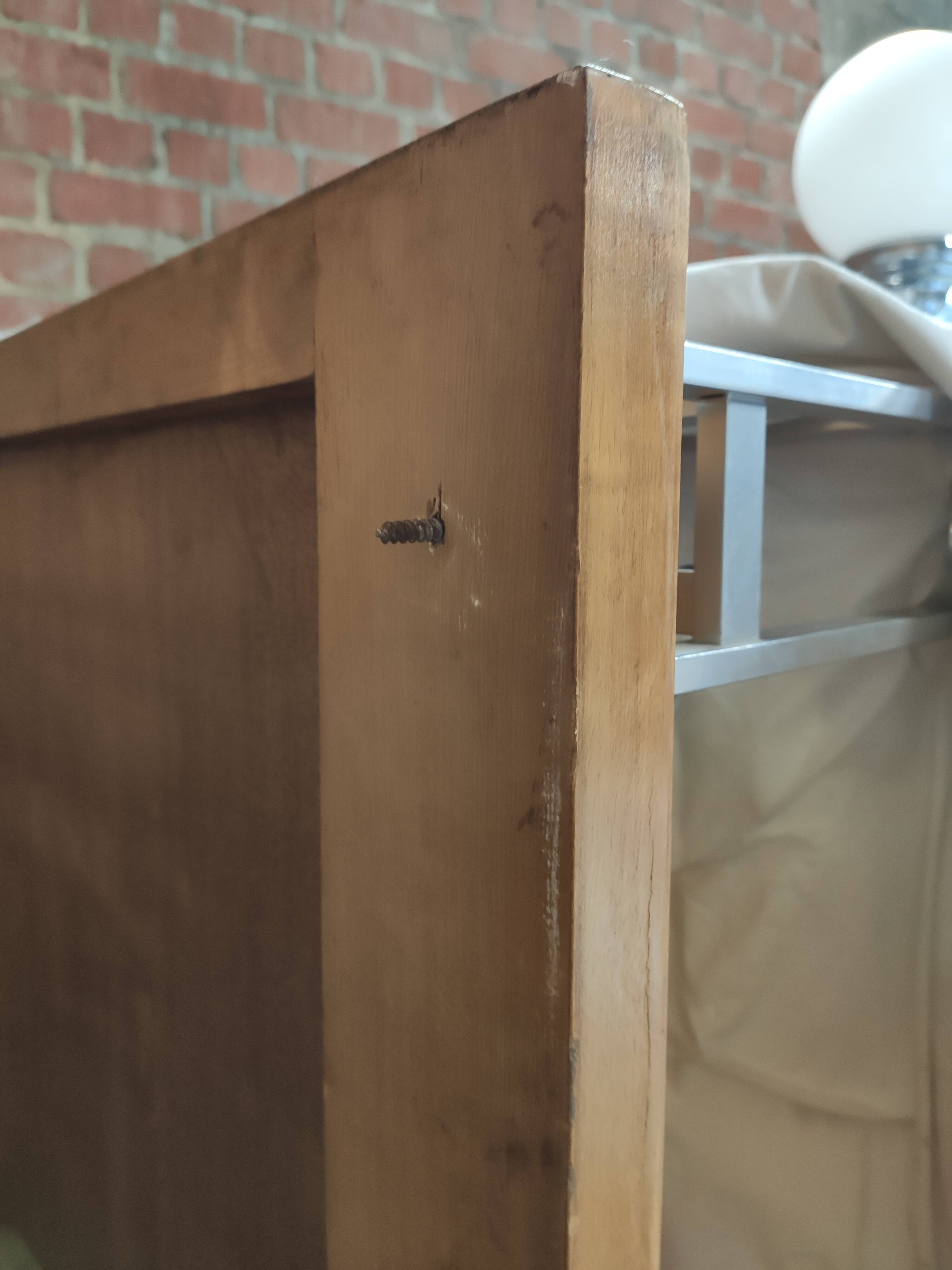 Modernist wall-mounted cloakroom in teak