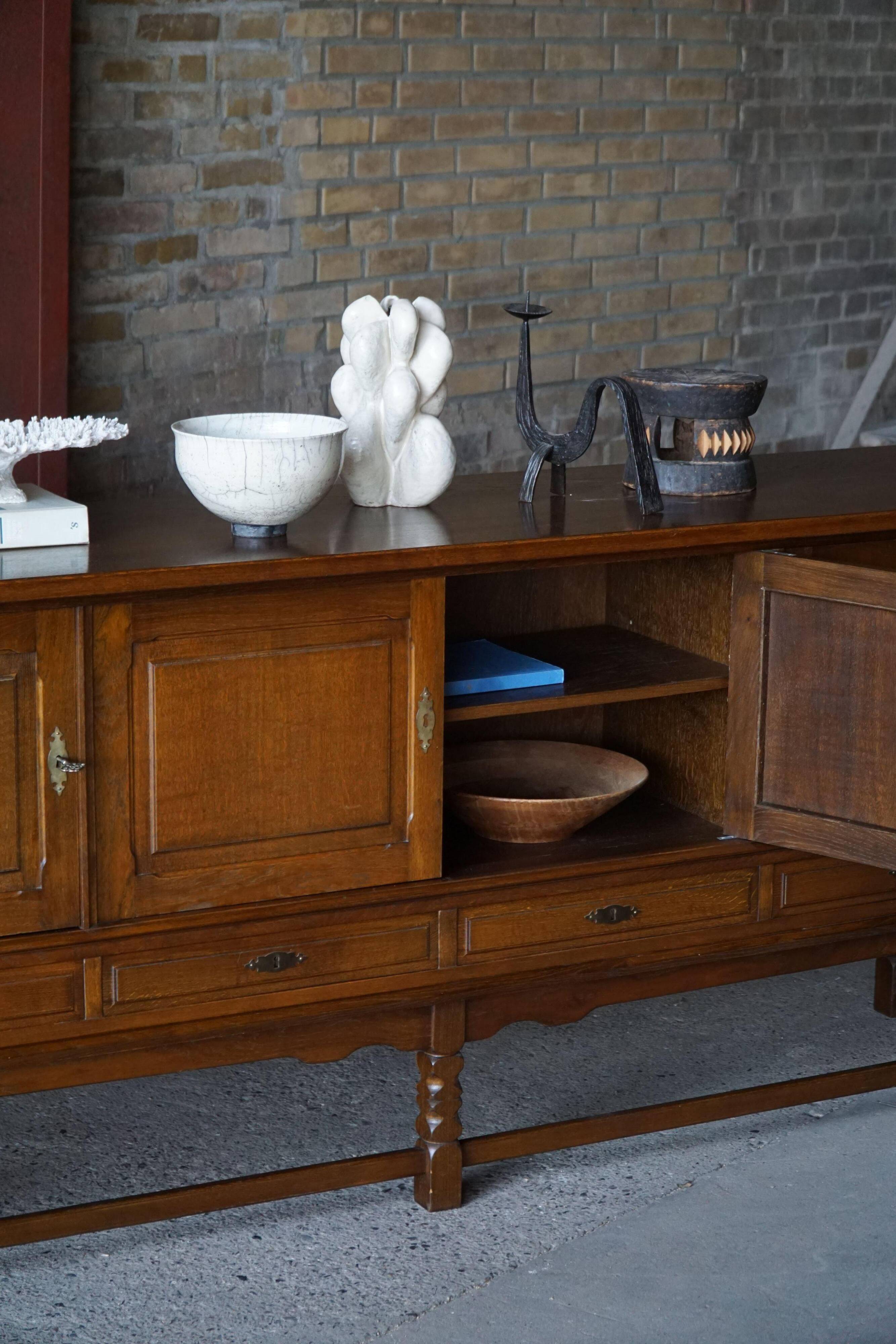 Danish enfilade from the mid-modern century in dark stained oak, 1960s.