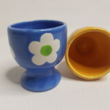 Pair of blue and yellow cockroaches with floral motifs