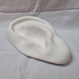 Empty pocket in the shape of an ear