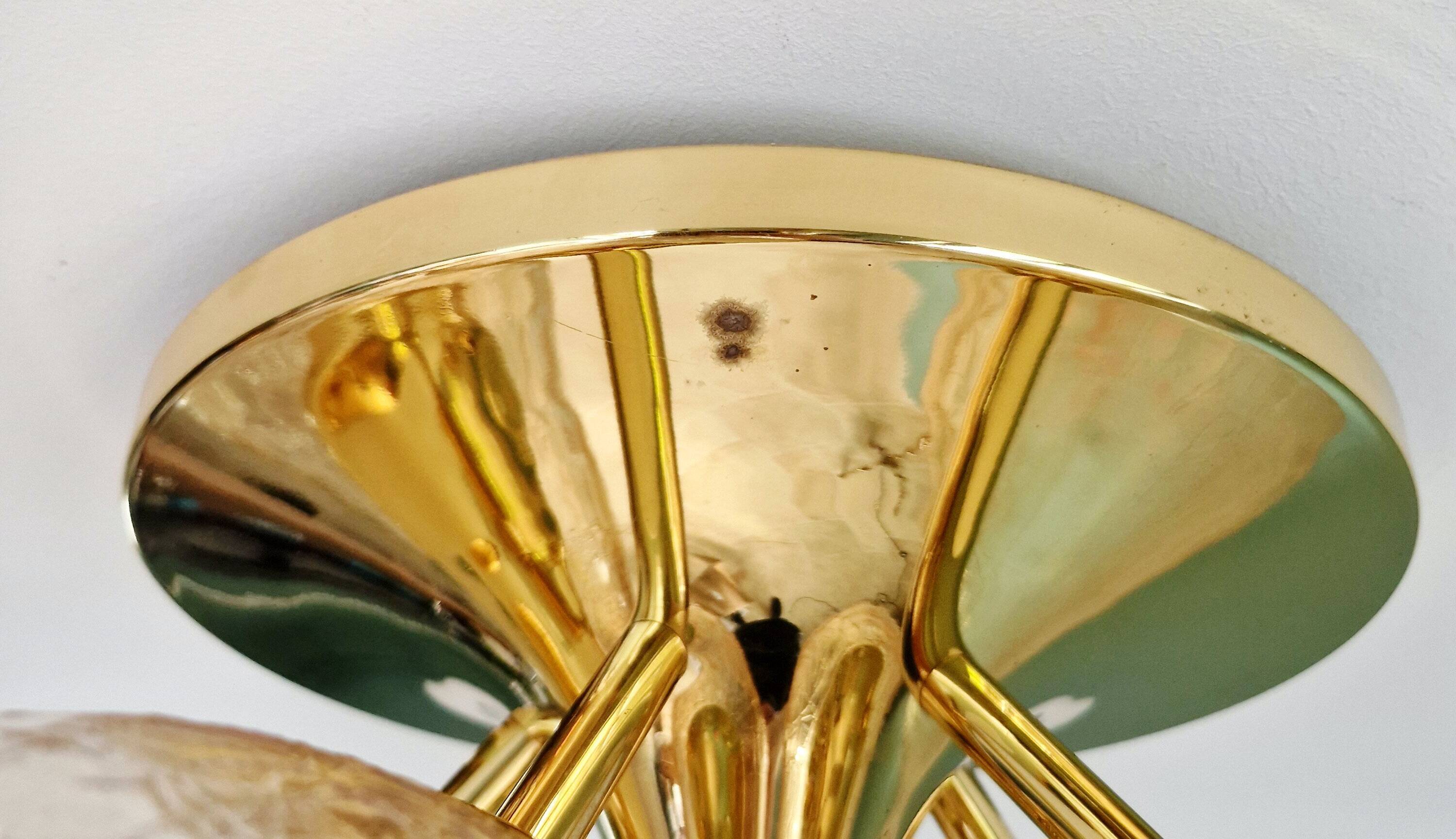 Large designer ceiling light in brass and amber crackled glass, 1970s.