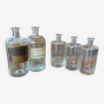 Series of 5 blown glass apothecary pharmacy bottles