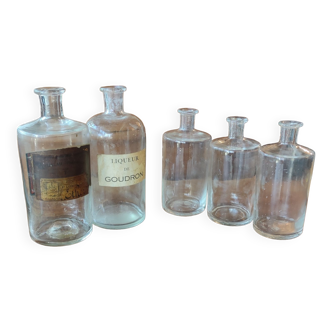 Series of 5 blown glass apothecary pharmacy bottles