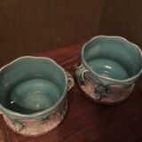 Pair of pot cache in barbotine earthenware