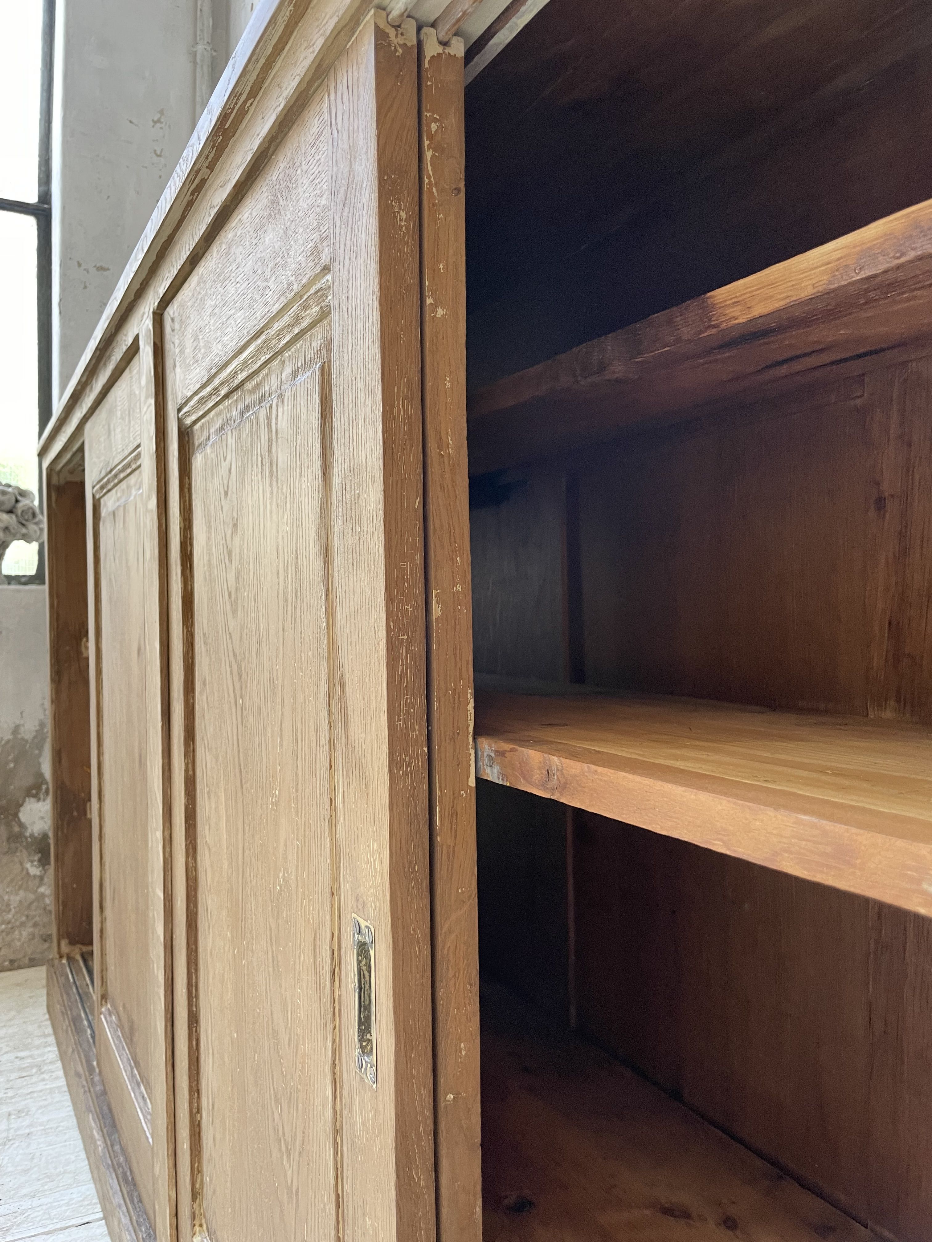 Large row of solid oak loom sliding doors
