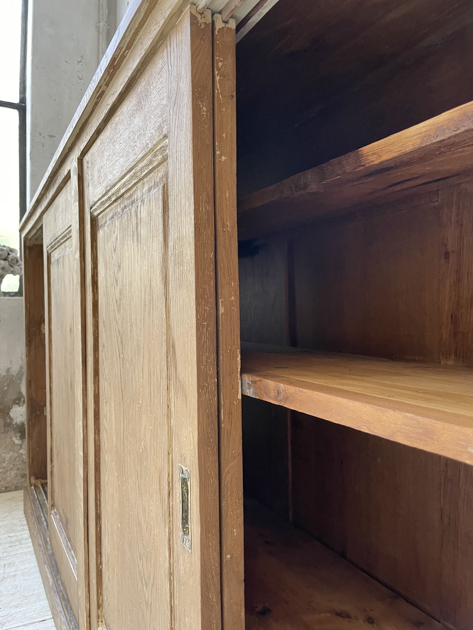 Large row of solid oak loom sliding doors