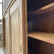 Large row of solid oak loom sliding doors