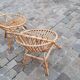 Pairs of shell rattan armchairs from the 50