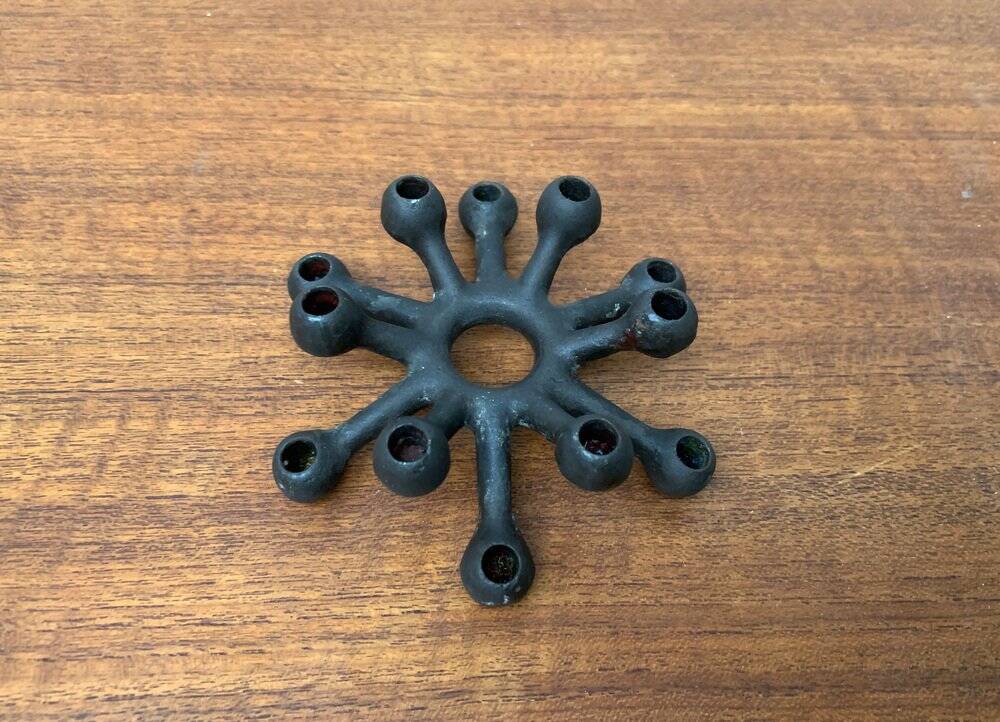 Brutalist Danish candle holder from the mid-century in cast iron by Jens H. Quistgaard.