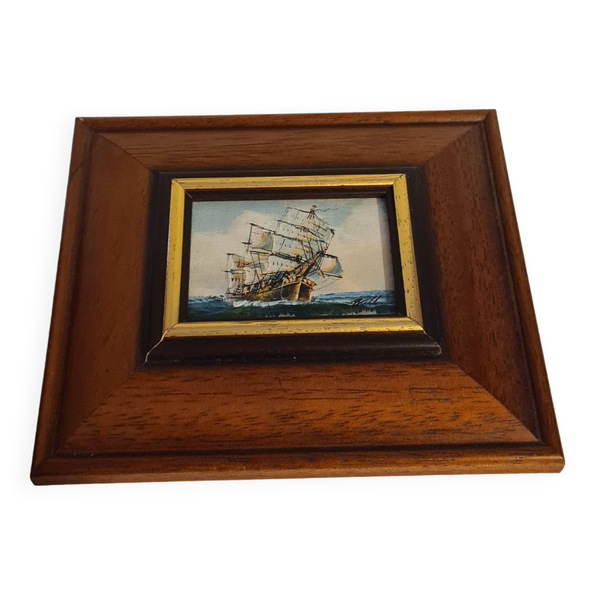 Wooden frame with boat decor